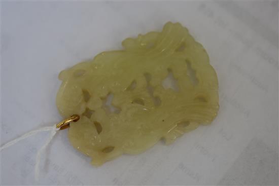 A Chinese carved pendant.